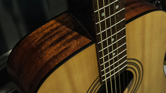 Solid Top vs Laminate Top Acoustic Guitar — Is It Worth the Extra Price?